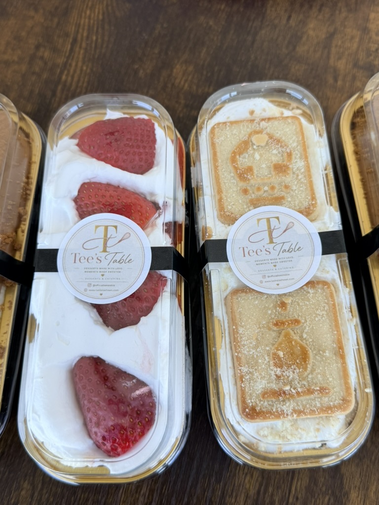 Tee's Table 6.8 oz mini desserts — strawberry cheesecake and banana pudding, sealed with the Tee's Table sticker