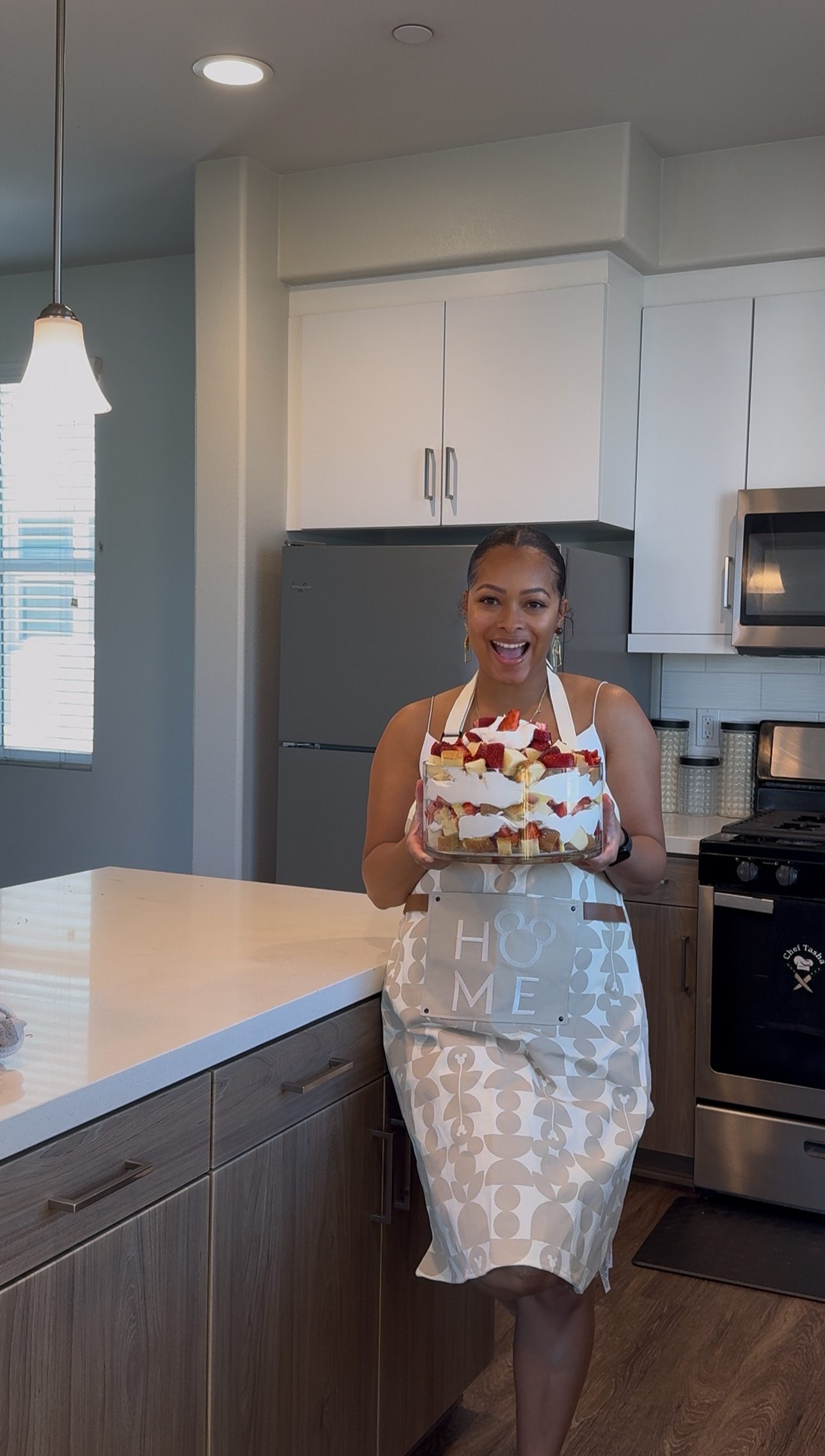 Tasha LaShawn in the kitchen with a fresh trifle